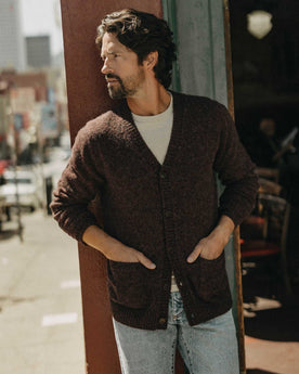 fit model leaning against the wall wearing The Eastmoor Cardigan in Heather Port Wool, Knits by Taylor Stitch