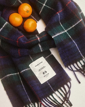 editorial image of The Fireside Scarf in Highland Navy Plaid with oranges, Accessories by Taylor Stitch