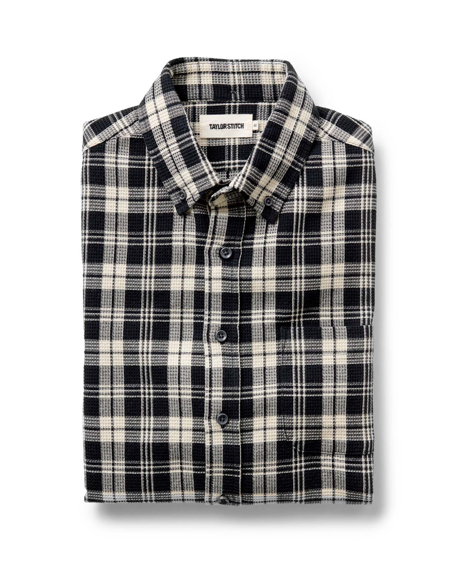 folded flatlay of The Jack in Coal Plaid Waffle, Wovens by Taylor Stitch