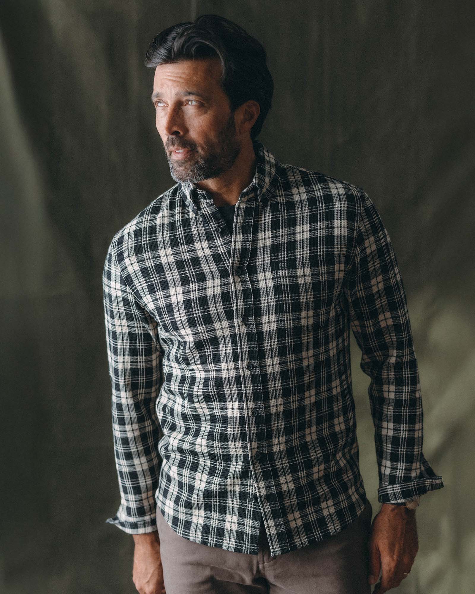 fit model posing in The Jack in Coal Plaid Waffle, Wovens by Taylor Stitch