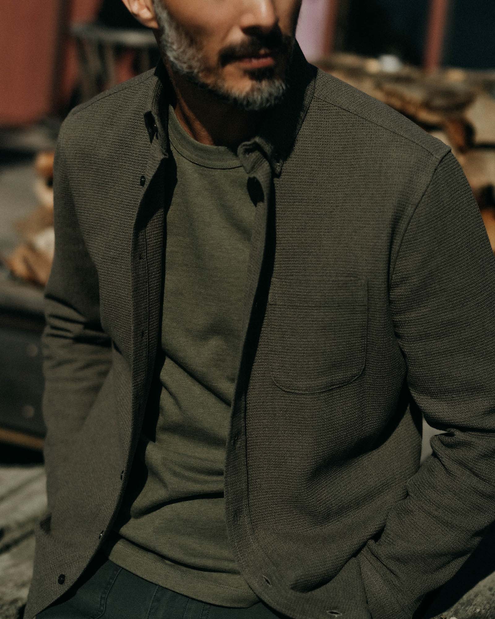 fit model posing in The Jack in Fatigue Olive Waffle, Wovens by Taylor Stitch