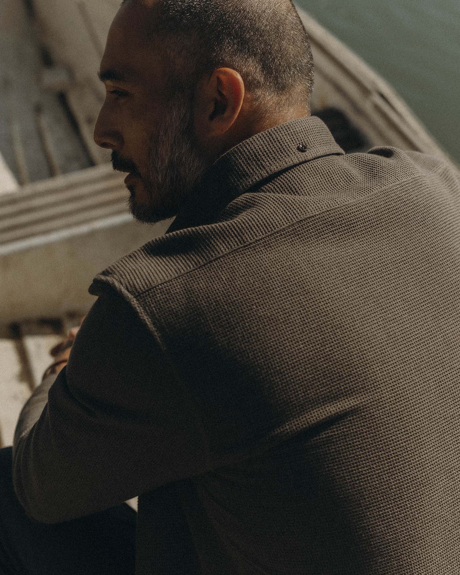 fit model showing off the back of The Jack in Fatigue Olive Waffle, Wovens by Taylor Stitch