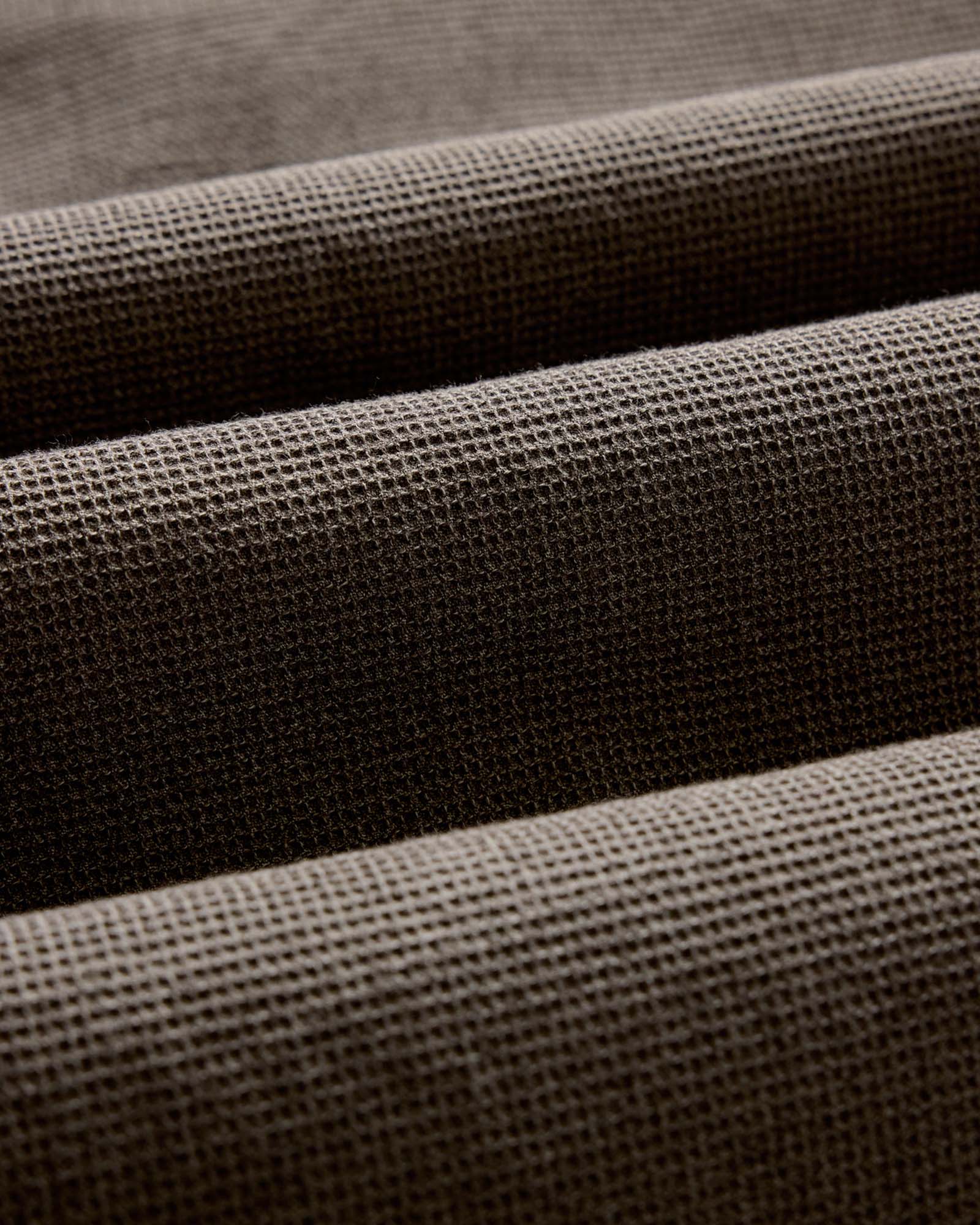 material shot of the fabric on The Jack in Fatigue Olive Waffle, Wovens by Taylor Stitch