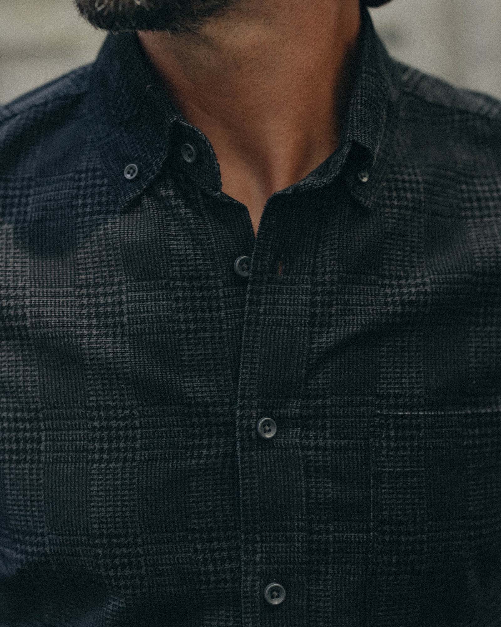 fit model showing off the collar on The Jack in Heather Coal Check Pincord, Wovens by Taylor Stitch