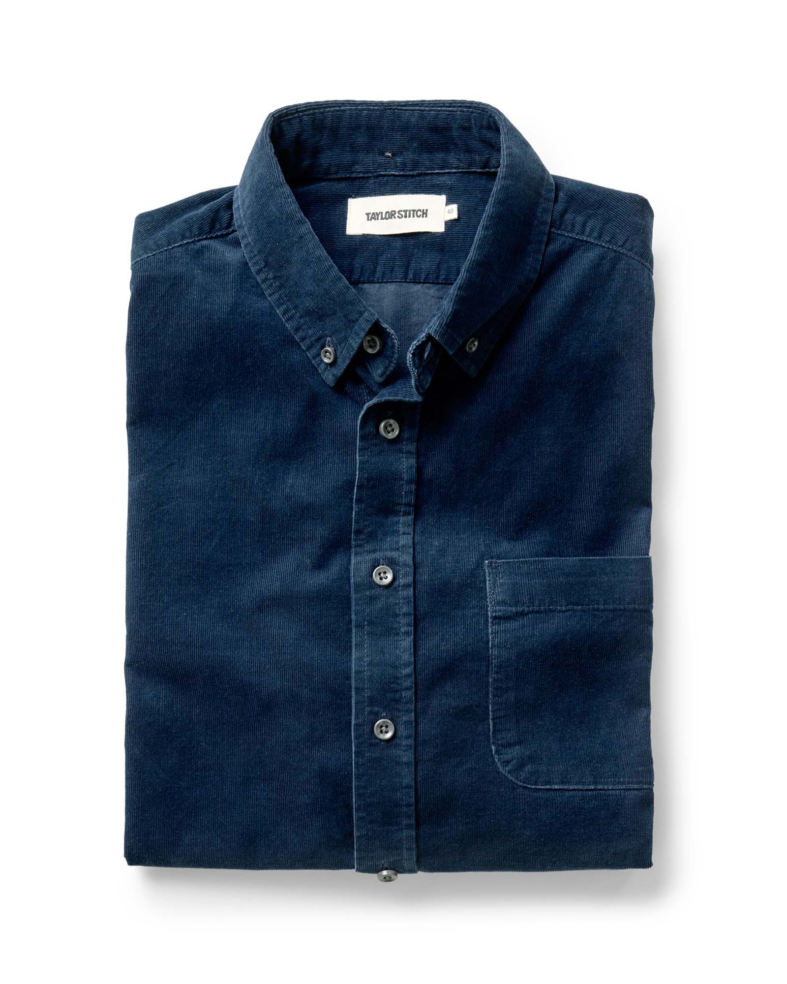 folded flatlay of The Jack in Heather Rinsed Indigo Pincord, Wovens by Taylor Stitch