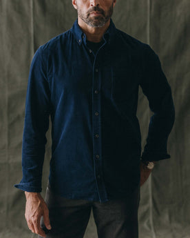 fit model posing in The Jack in Heather Rinsed Indigo Pincord, Wovens by Taylor Stitch