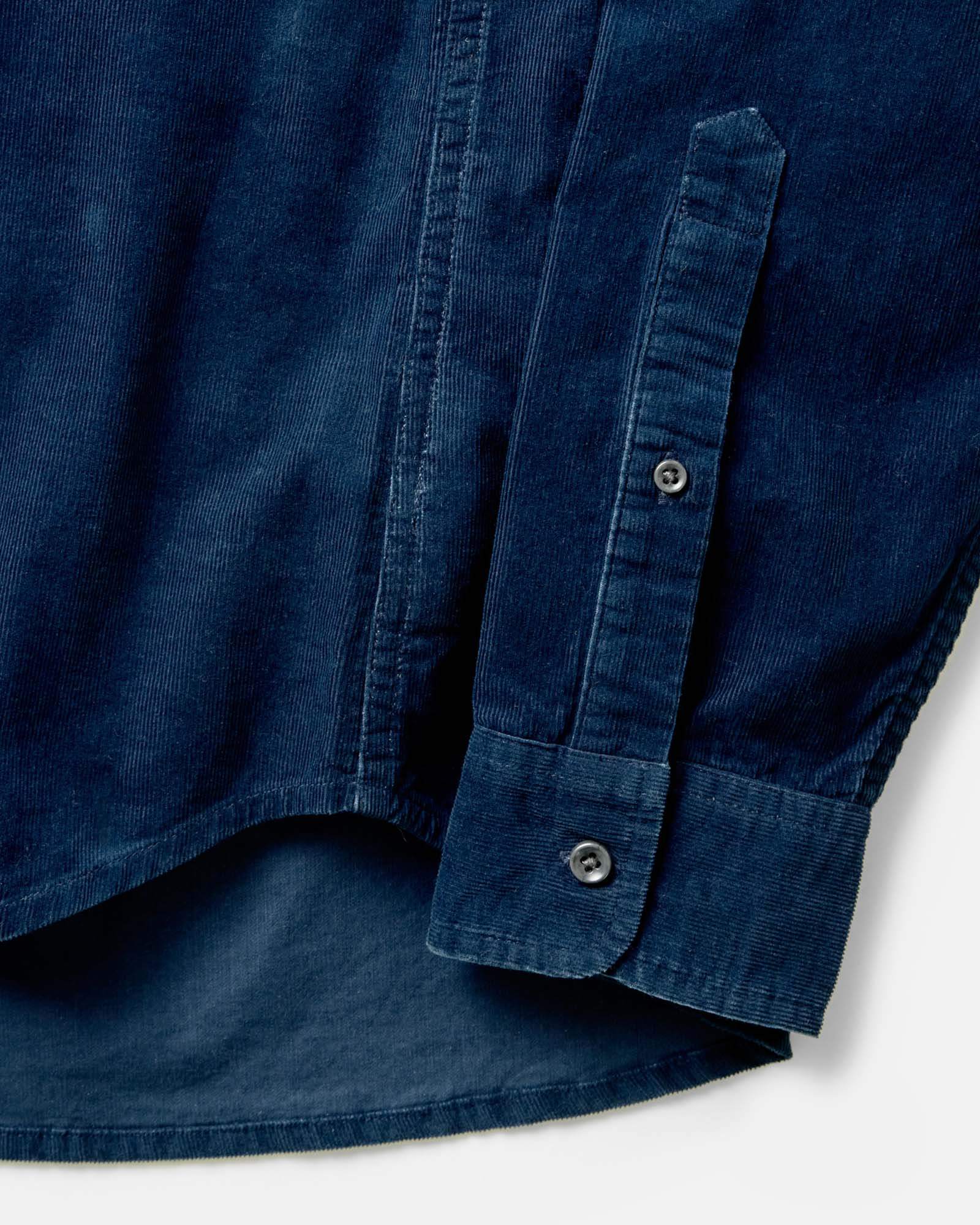 material shot of the sleeve on The Jack in Heather Rinsed Indigo Pincord, Wovens by Taylor Stitch