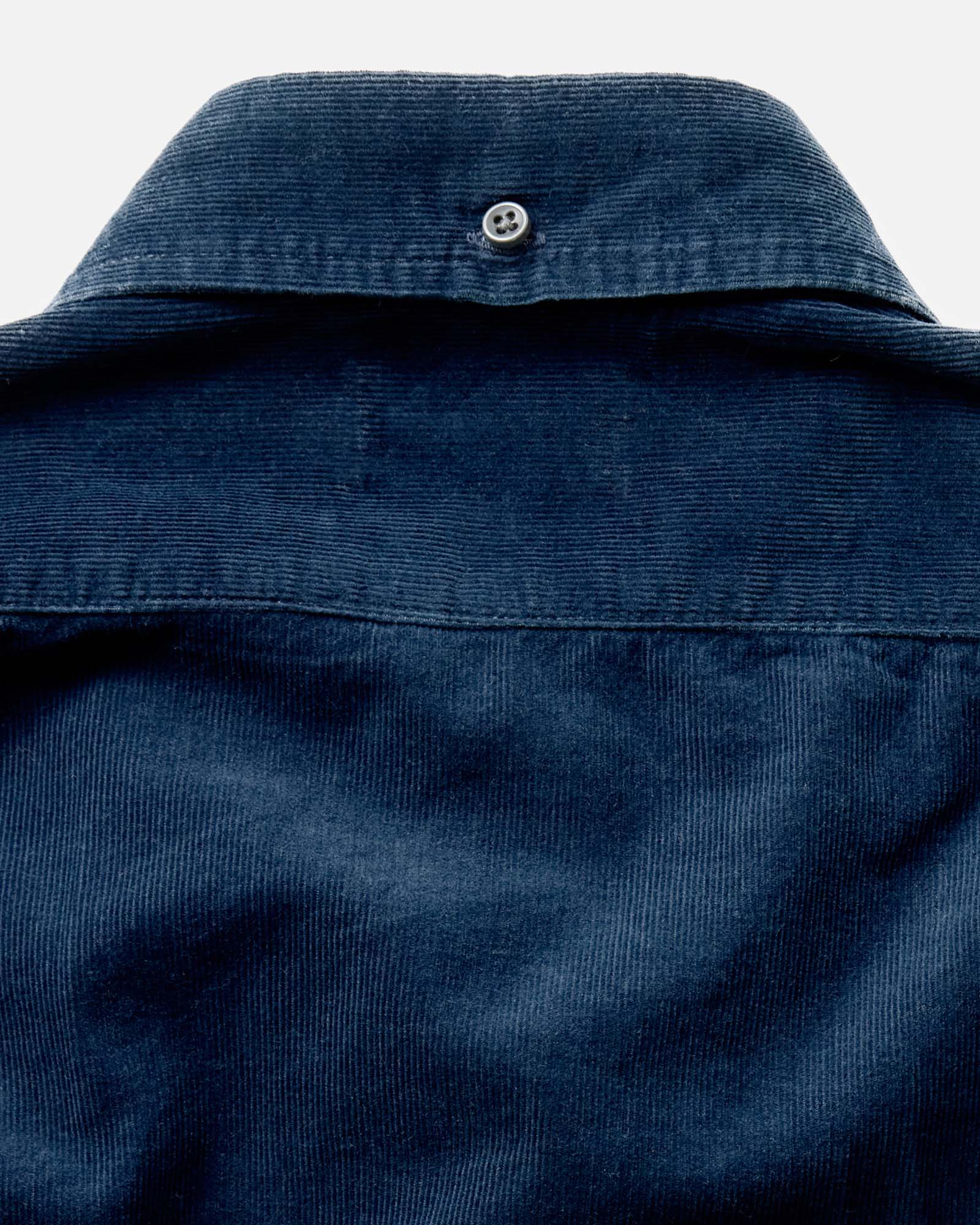 material shot of the back collar on The Jack in Heather Rinsed Indigo Pincord, Wovens by Taylor Stitch