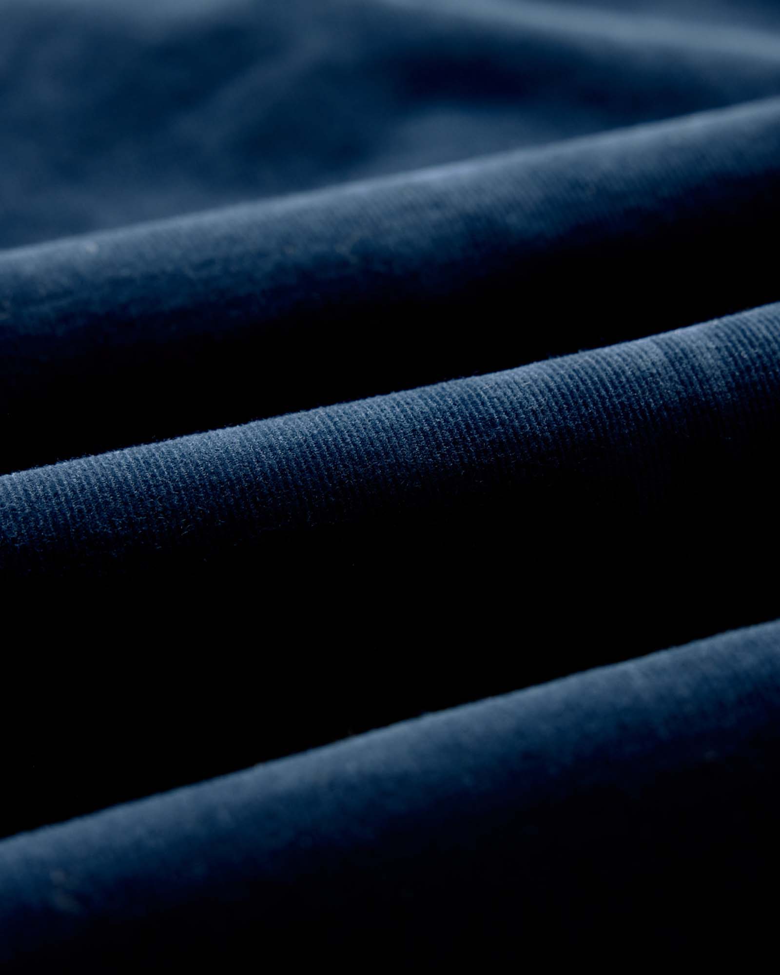 material shot of the fabric on The Jack in Heather Rinsed Indigo Pincord, Wovens by Taylor Stitch