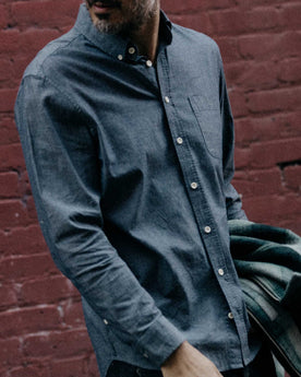 fit model with his hand in his pocket wearing The Jack in Rinsed Indigo Chambray, Wovens by Taylor Stitch