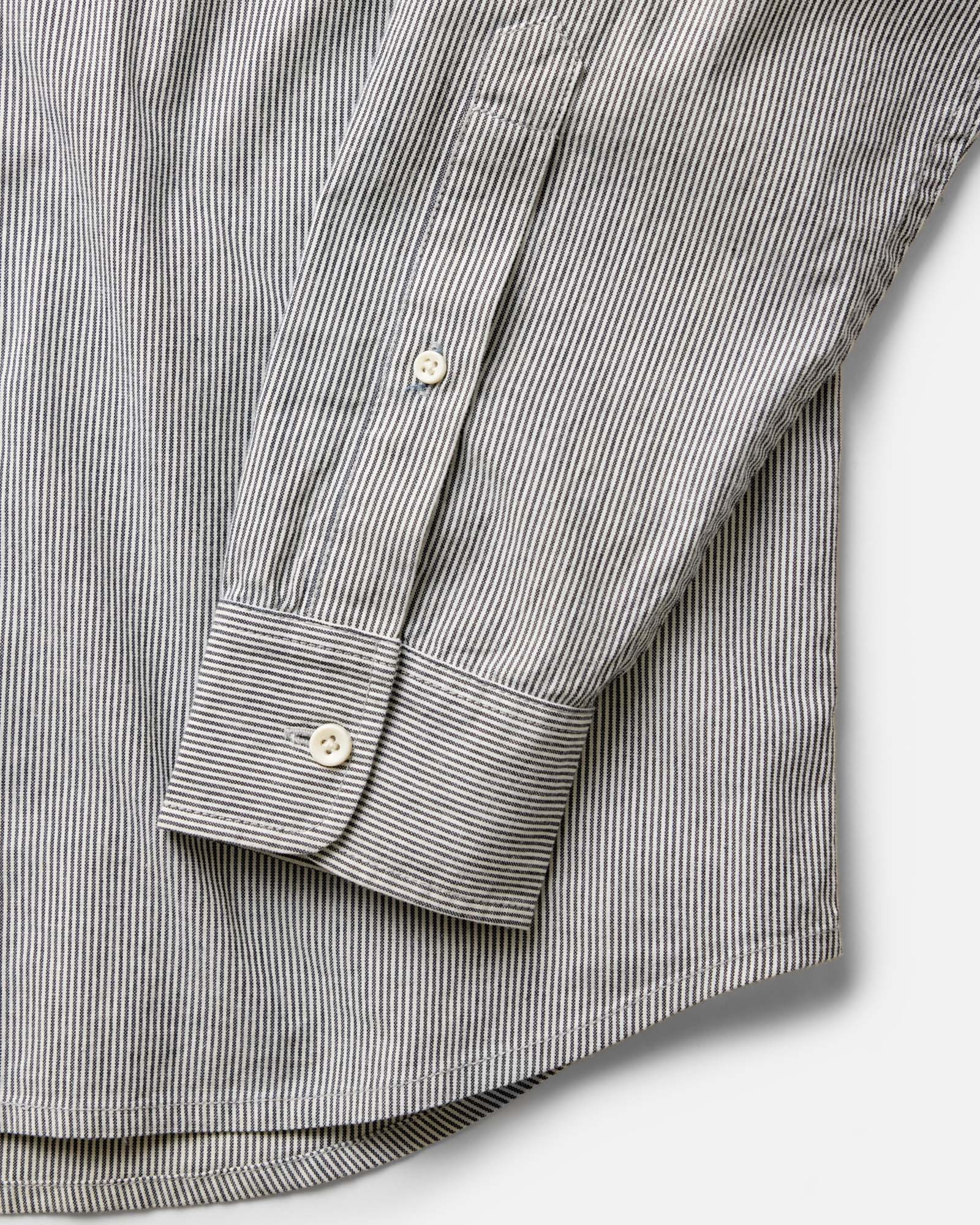 material shot of the sleeve on The Jack in Rinsed Indigo Stripe Chambray, Wovens by Taylor Stitch