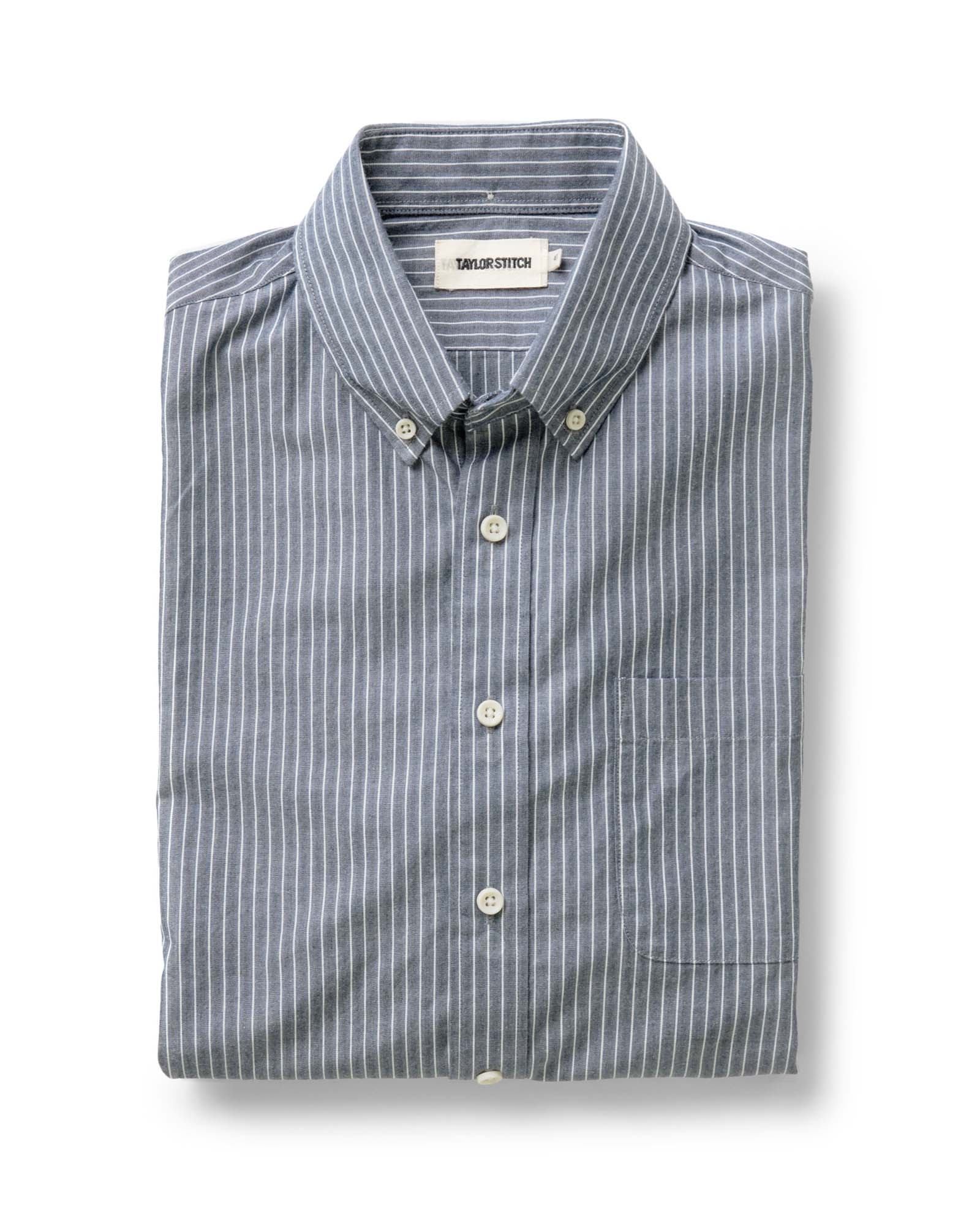 folded flatlay of The Jack in Rinsed Indigo Stripe, Wovens by Taylor Stitch