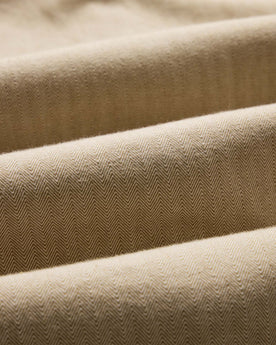 material shot of the fabric on The Jack in Sand Herringbone, Wovens by Taylor Stitch