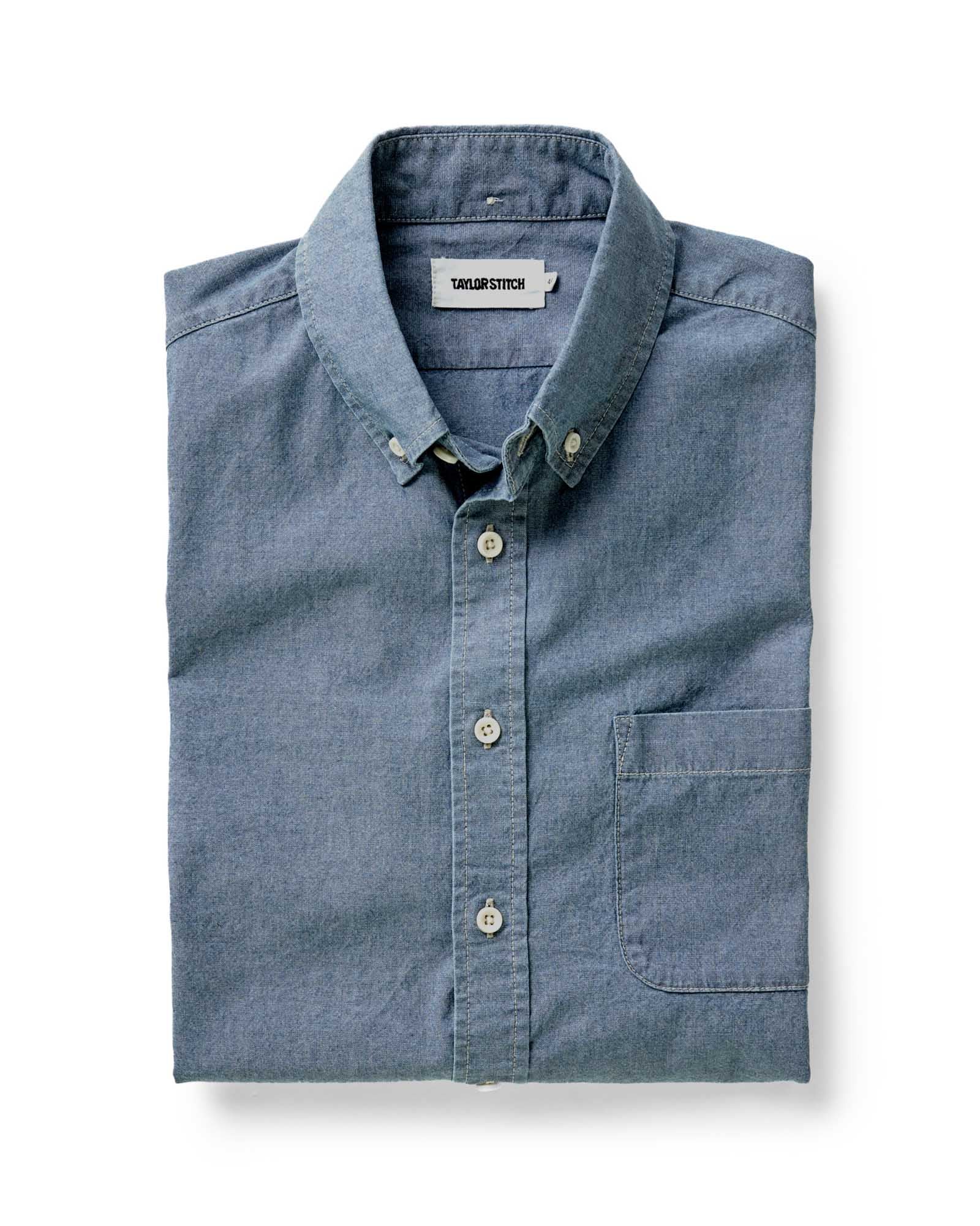 folded flatlay of The Jack in Washed Indigo Chambray, Wovens by Taylor Stitch
