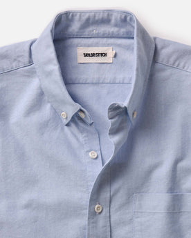 fit model adjusting sleeves on The Jack in Blue Everyday Oxford, Wovens by Taylor Stitch