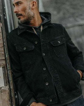 fit model posing in The Long Haul Jacket in Black Indigo Waffle, Outerwear by Taylor Stitch