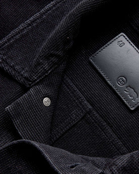 material shot of the inner collar on The Long Haul Jacket in Black Indigo Waffle, Outerwear by Taylor Stitch
