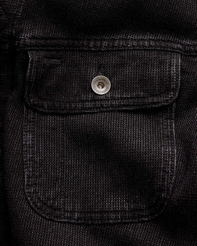 material shot of the pocket on The Long Haul Jacket in Black Indigo Waffle, Outerwear by Taylor Stitch