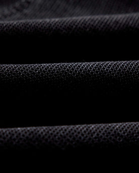 material shot of the fabric on The Long Haul Jacket in Black Indigo Waffle, Outerwear by Taylor Stitch