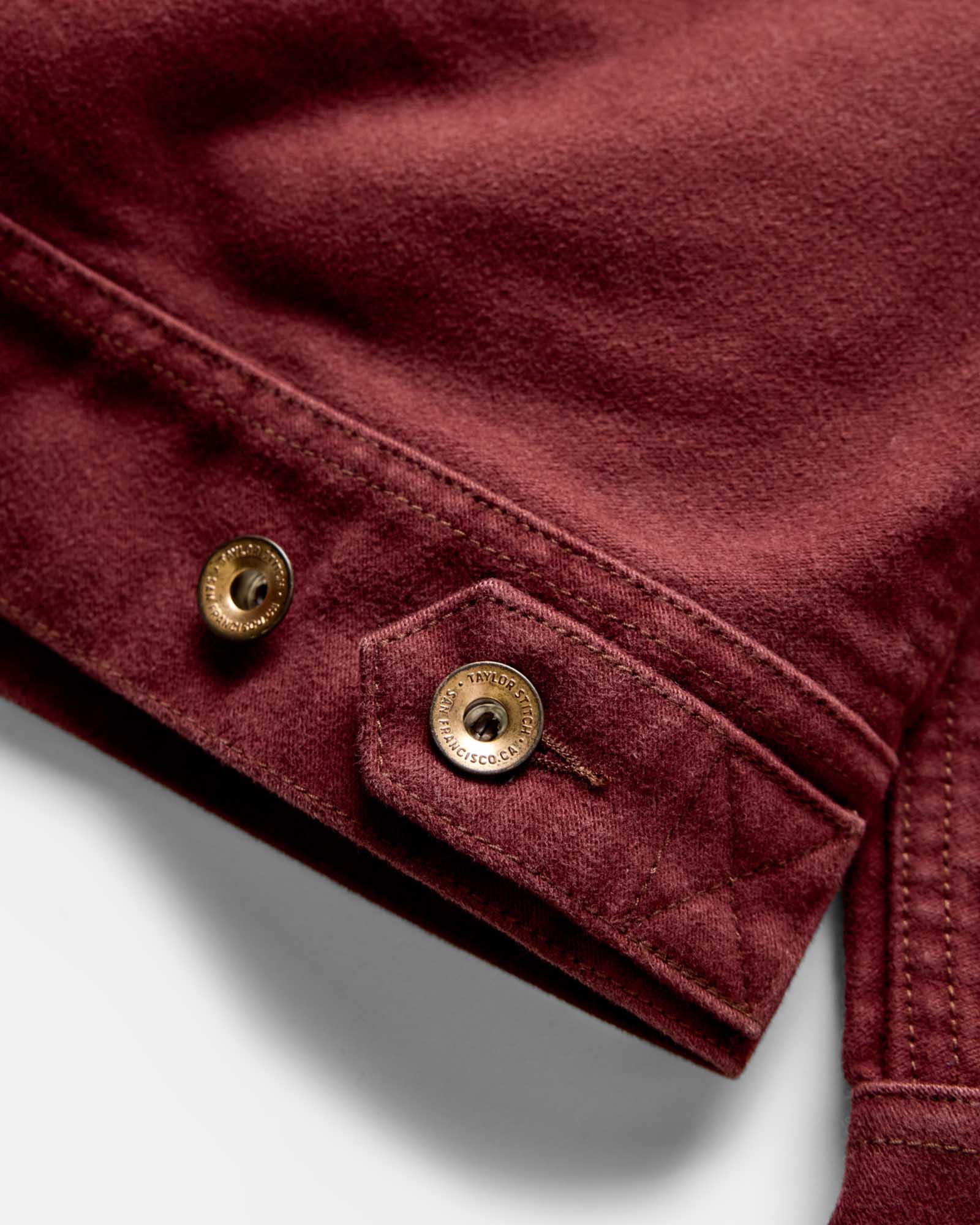 material shot of the button on The Long Haul Jacket in Dried Cherry Moleskin, Outerwear by Taylor Stitch