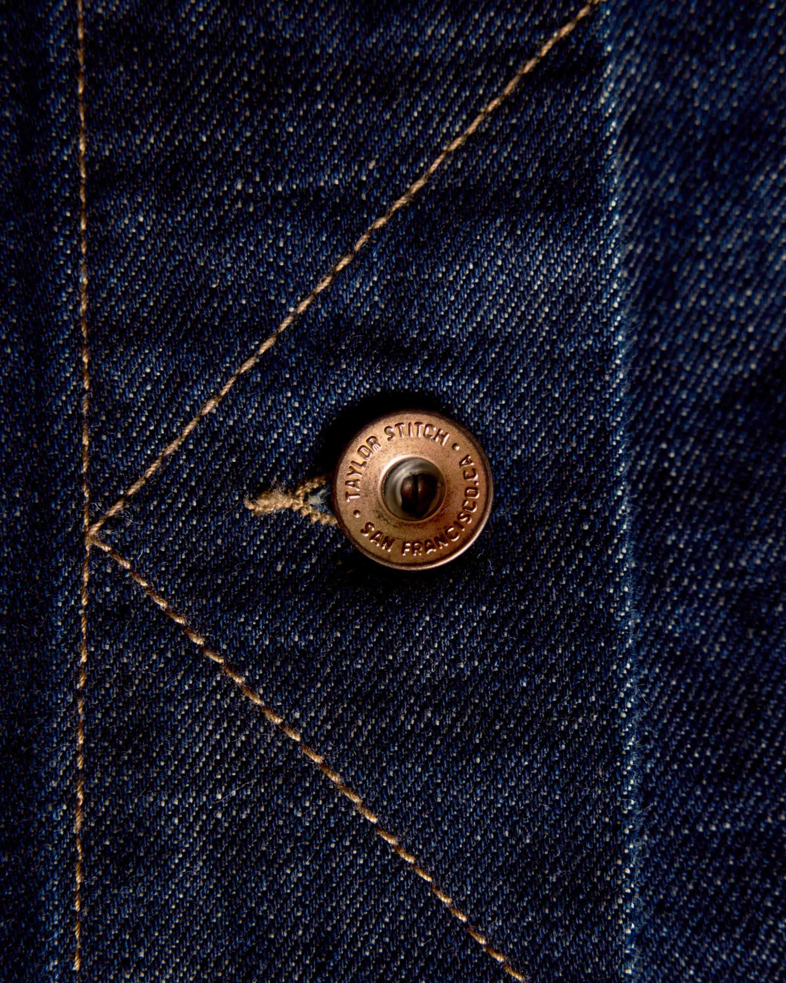 material shot of the buttons on The Long Haul Jacket in Rinsed Organic Selvedge, Outerwear by Taylor Stitch