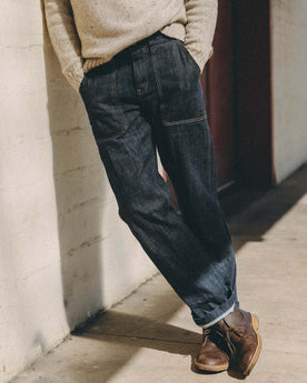 fit model posing in The Mariner Jean in Rinse Organic Selvedge, Bottoms by Taylor Stitch