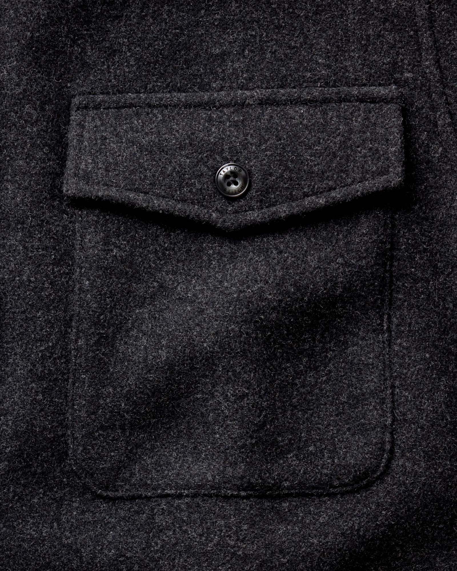 material shot of the pocket on The Maritime Shirt Jacket in Heather Charcoal Wool, Outerwear by Taylor Stitch