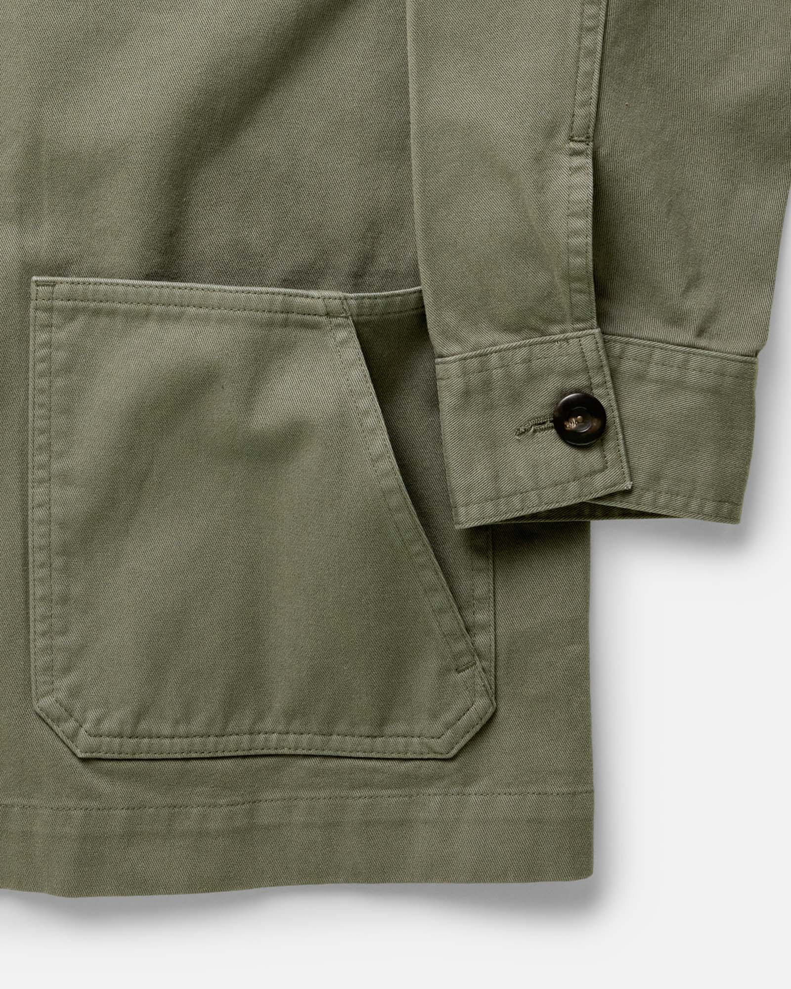 material shot of the pocket on The Ojai Jacket in Organic Smoked Olive Foundation Twill, Outerwear by Taylor Stitch
