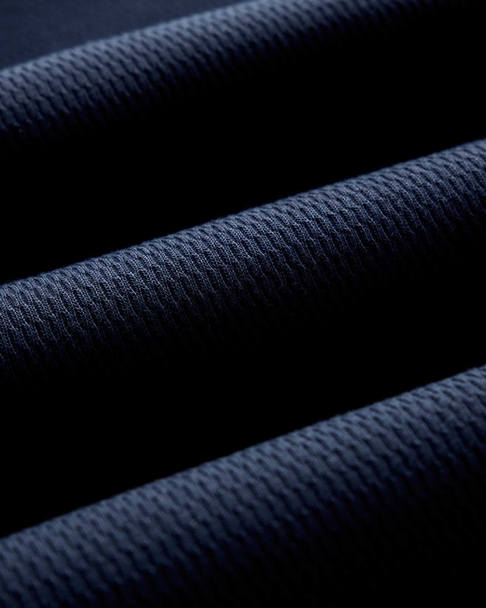 Seed-stitch waffle texture detail of The Organic Cotton Crew in Dark Navy Waffle, Knits by Taylor Stitch