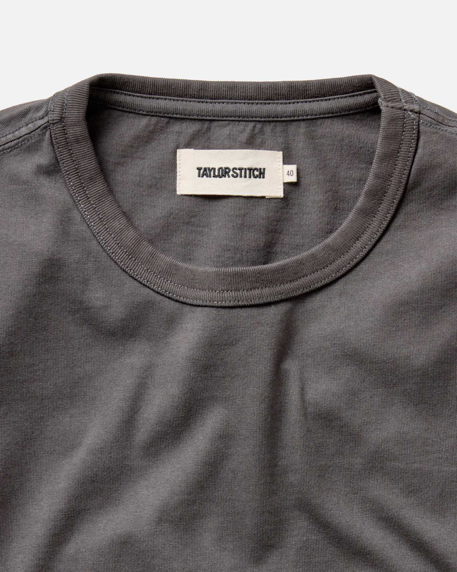 material shot of the collar on The Organic Cotton Long Sleeve Tee in Faded Black, Knits by Taylor Stitch