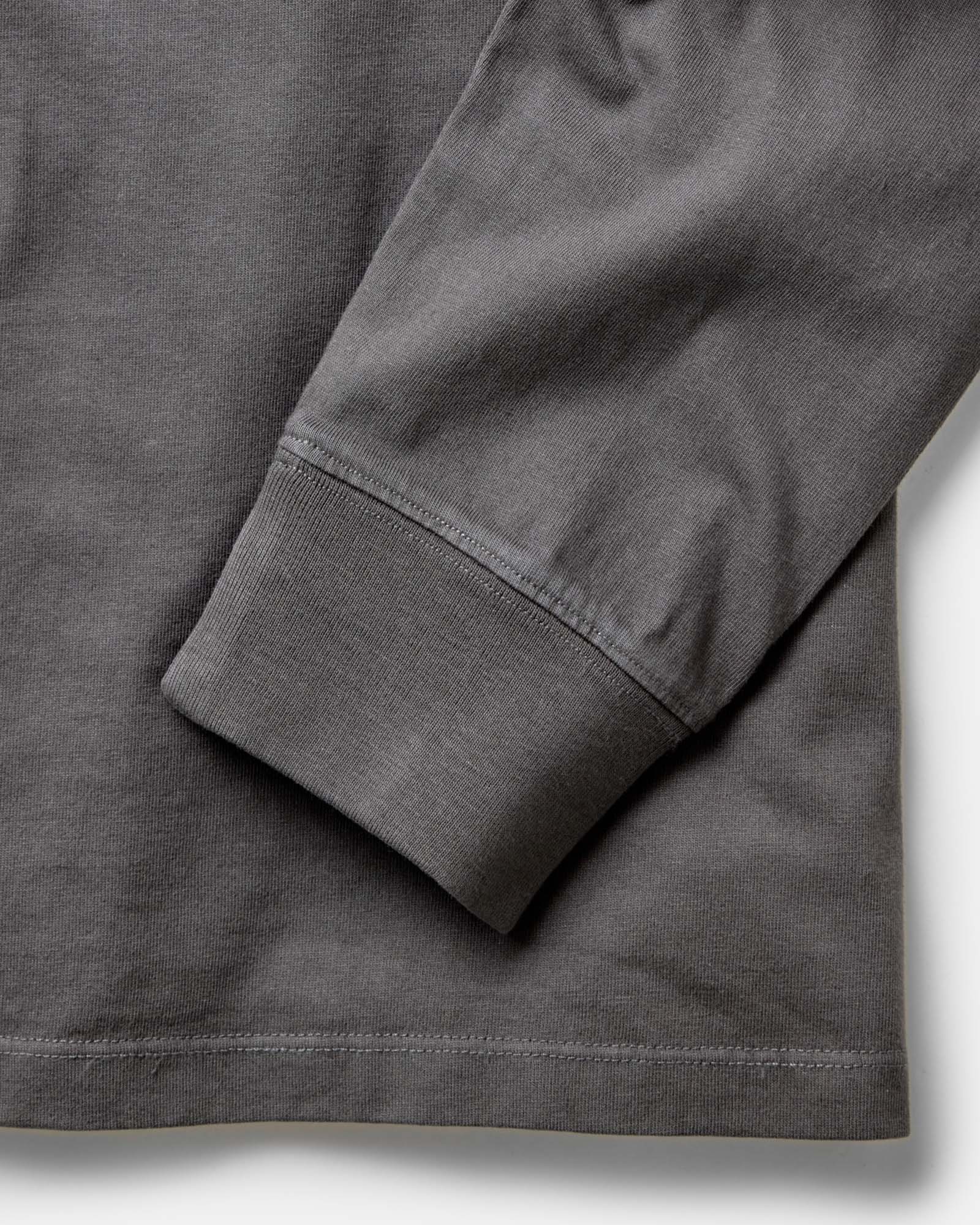 material shot of the sleeves on The Organic Cotton Long Sleeve Tee in Faded Black, Knits by Taylor Stitch