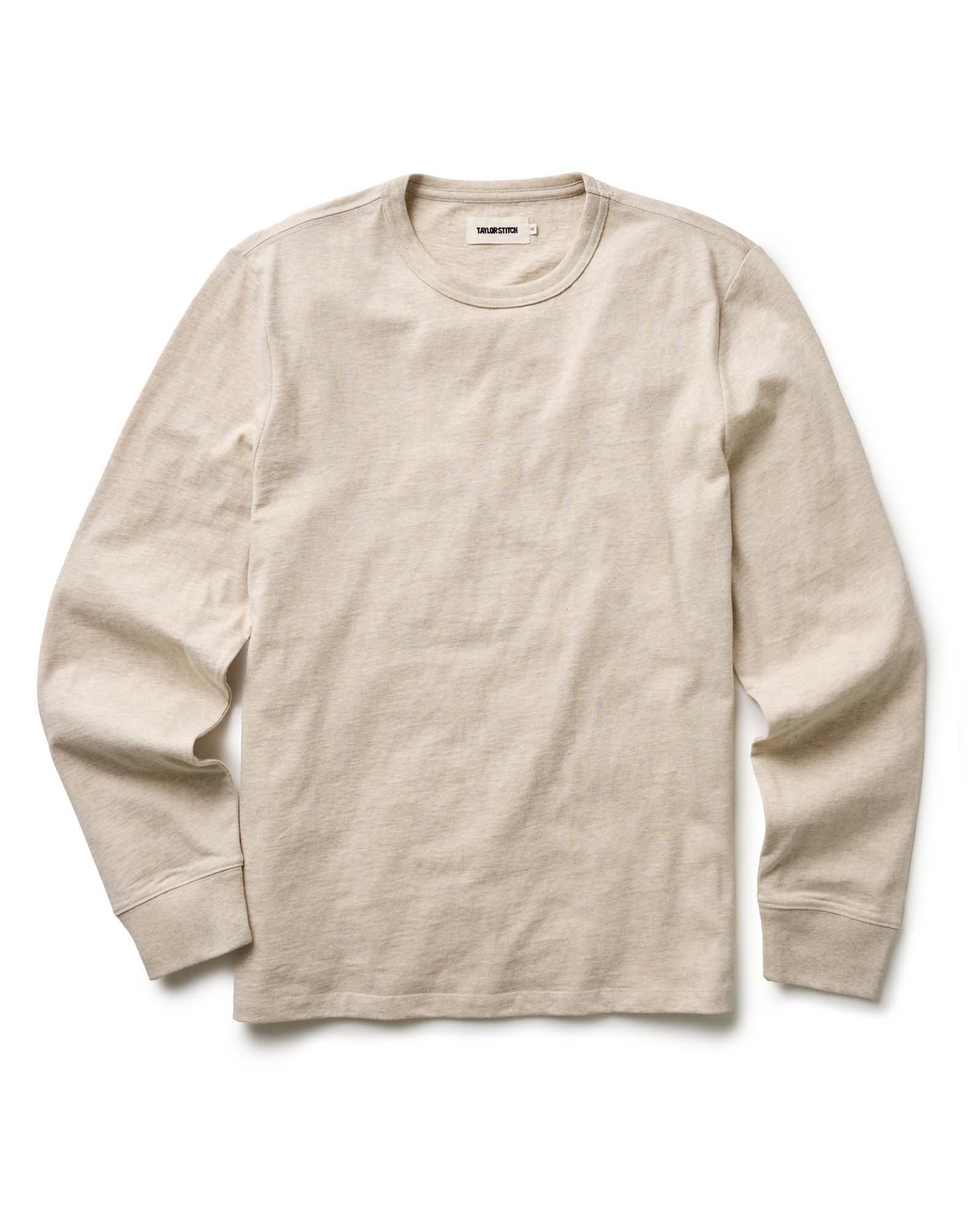 flatlay of The Organic Cotton Long Sleeve Tee in Heather Oat, Knits by Taylor Stitch