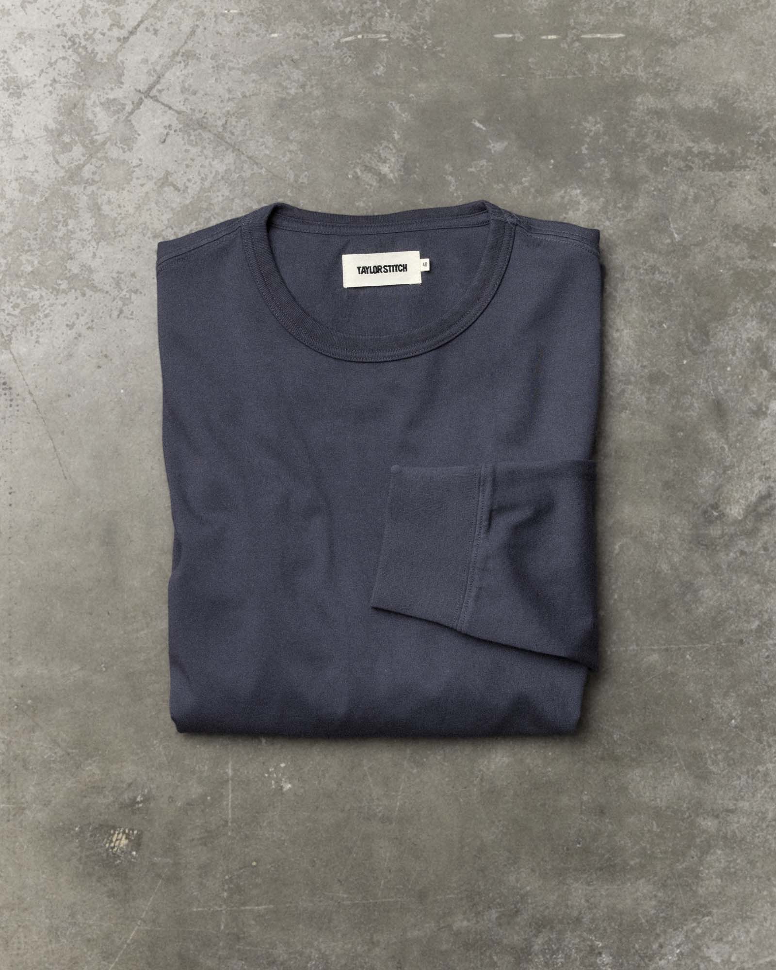 folded flatlay of The Organic Cotton Long Sleeve Tee in Navy, Knits by Taylor Stitch