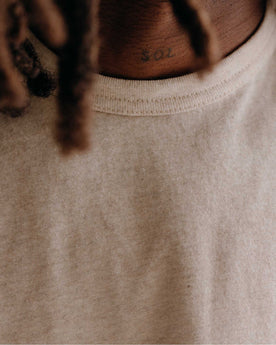 fit model showing off the collar on The Organic Cotton Tee in Heather Oat, Knits by Taylor Stitch