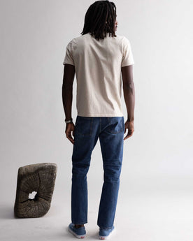 fit model showing off the back of The Organic Cotton Tee in Heather Oat, Knits by Taylor Stitch