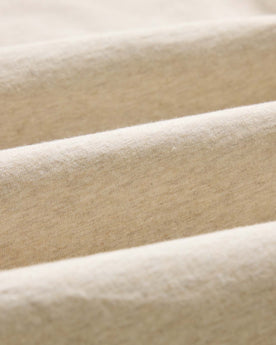 material shot of the fabric on The Organic Cotton Tee in Heather Oat, Knits by Taylor Stitch