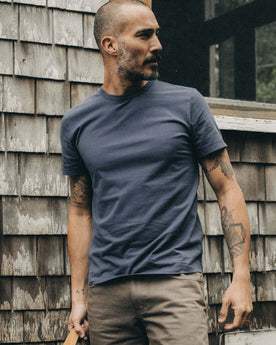 fit model in The Organic Cotton Tee in Navy, Knits by Taylor Stitch