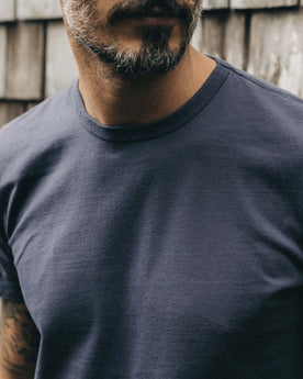fit model showing the front of fit model wearing The Organic Cotton Tee in Navy, Knits by Taylor Stitch