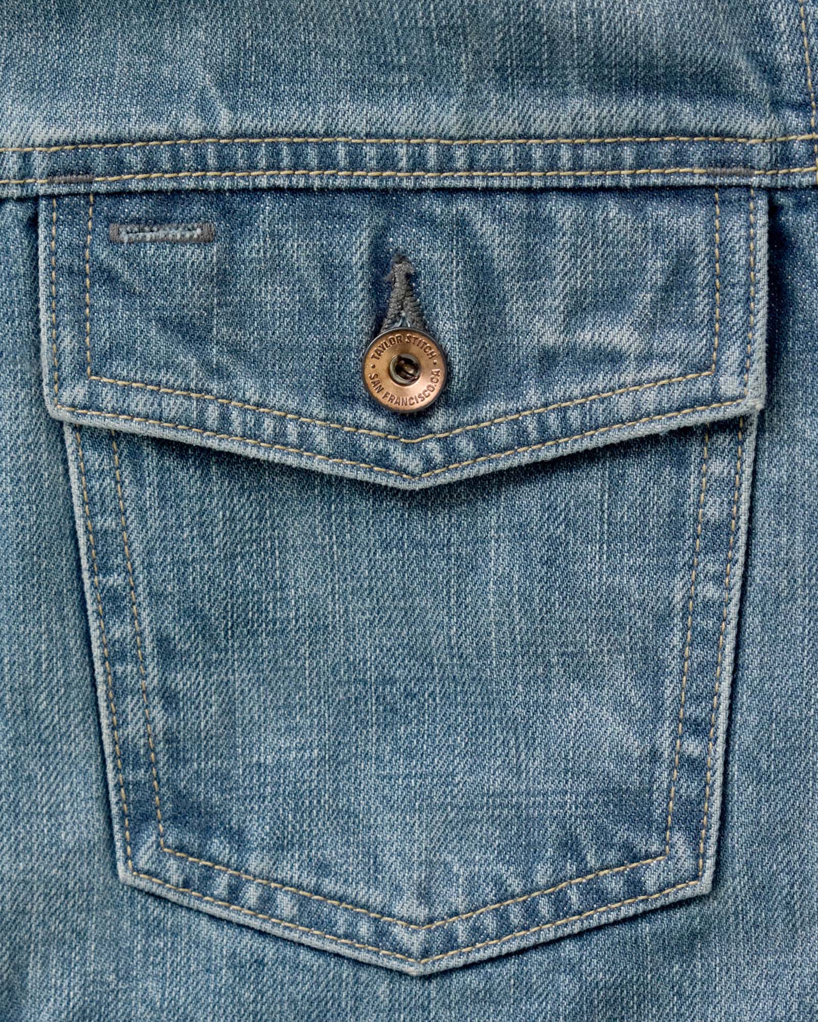 material shot of the pocket on The Roper Jacket in Vintage Wash Organic Selvedge, Outerwear by Taylor Stitch