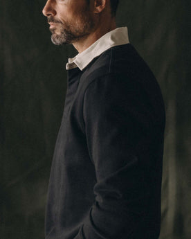 fit model showing off The Rugby Shirt in Coal, Knits by Taylor Stitch