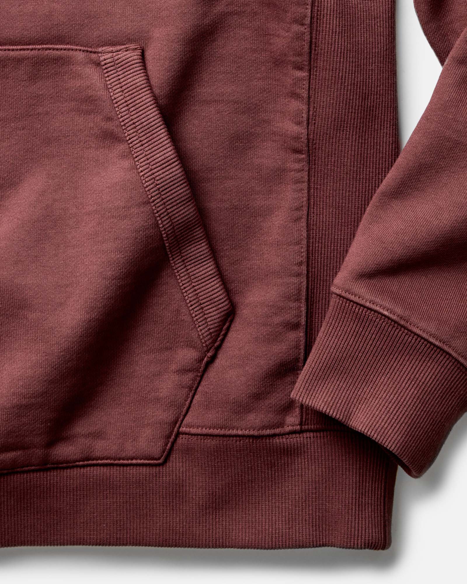 material shot of the sleeves on The Shop Hoodie in Dried Cherry, Knits by Taylor Stitch