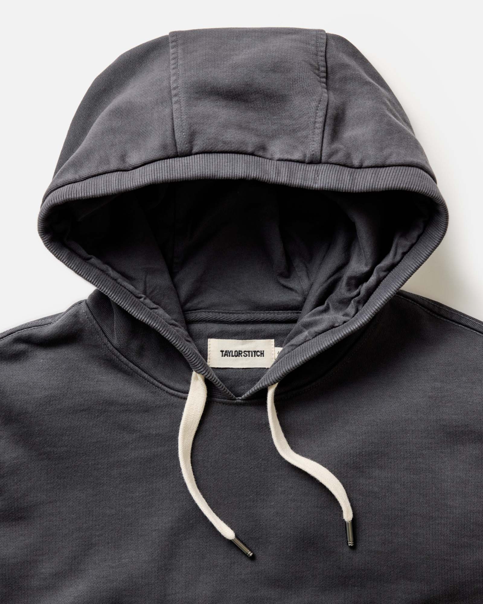 material shot of the hood on The Shop Hoodie in Faded Black, Knits by Taylor Stitch
