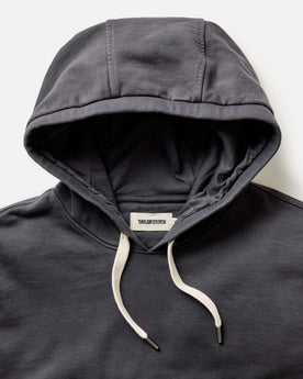 material shot of the hood on The Shop Hoodie in Faded Black, Knits by Taylor Stitch