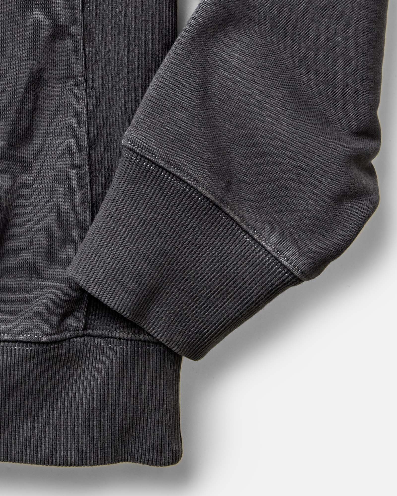 material shot of the sleeves on The Shop Hoodie in Faded Black, Knits by Taylor Stitch