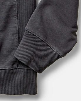 material shot of the sleeves on The Shop Hoodie in Faded Black, Knits by Taylor Stitch