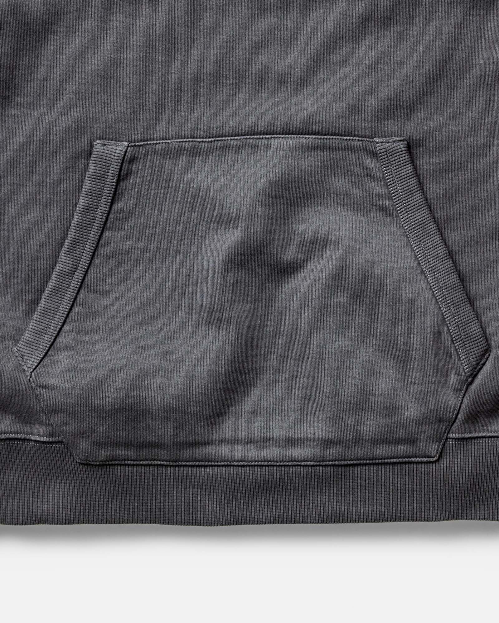 material shot of the pocket on The Shop Hoodie in Faded Black, Knits by Taylor Stitch