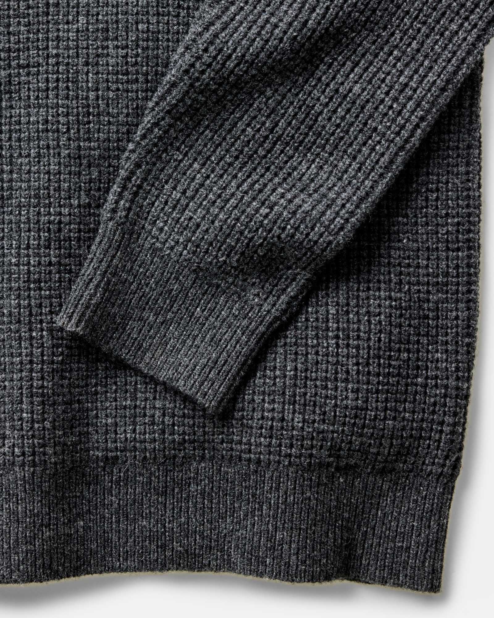 material shot of the sleeve on The Sidecountry Crew in Heather Graphite Merino Waffle, Knits by Taylor Stitch
