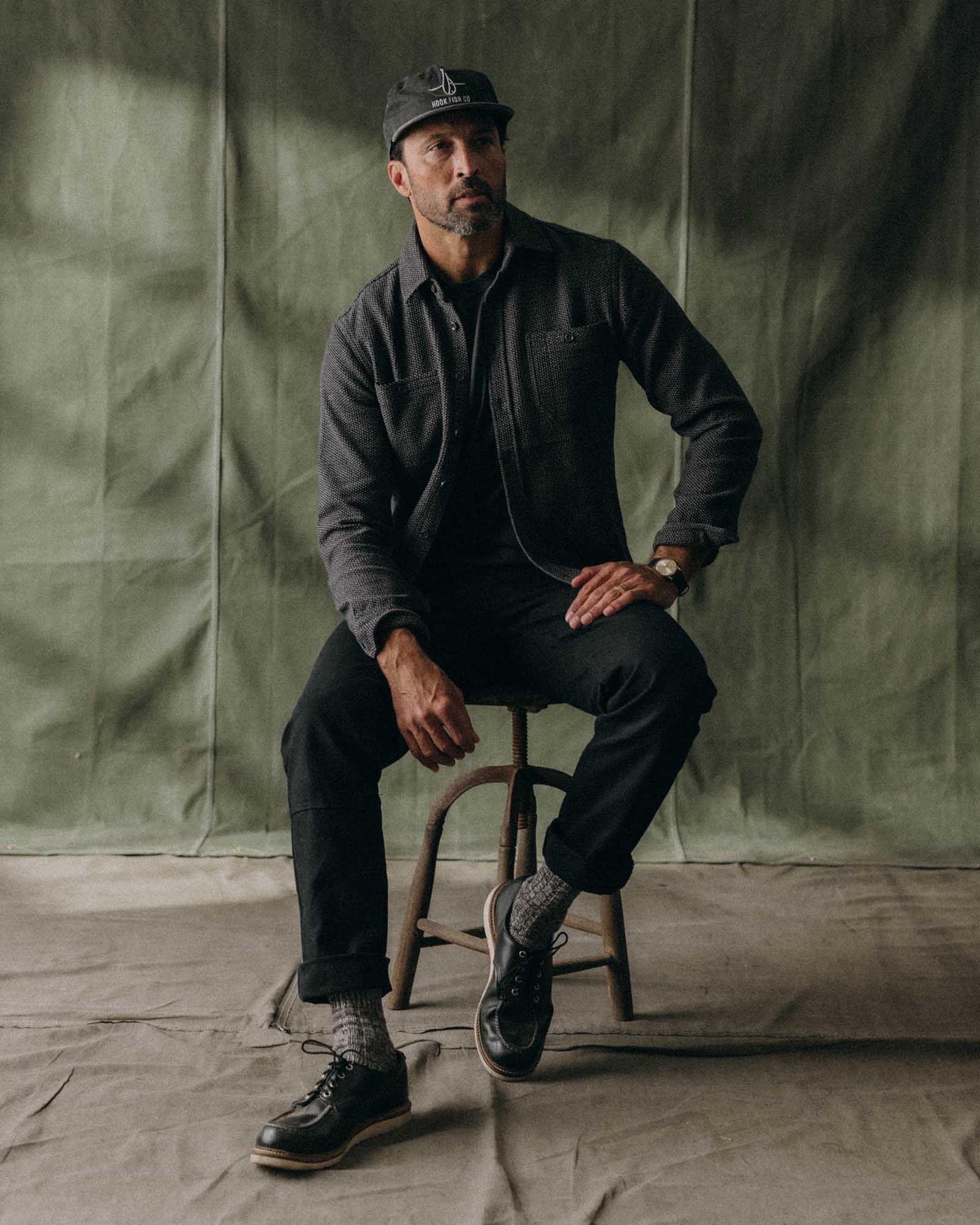 fit model posing in The Utility Shirt in Charcoal Sashiko, Wovens by Taylor Stitch