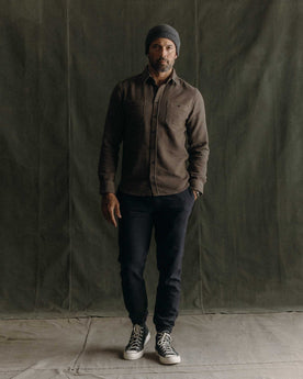 fit model posing in The Utility Shirt in Mulch Sashiko, Wovens by Taylor Stitch