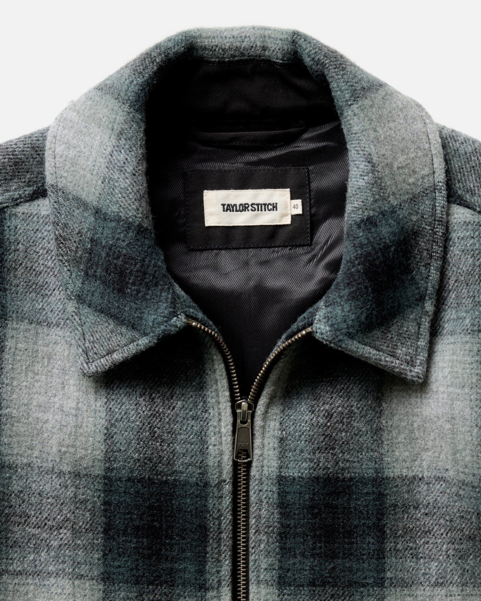 material shot of the collar on The Waterfront Jacket in Evergreen Plaid Wool, Outerwear by Taylor Stitch